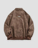 Brown faux suede bomber jacket, back view with a small metal plate