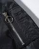 Close-up of the ring-pull zip pocket on the sleeve