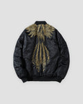 Black bomber jacket with gold thread wings and feathers embroidered on the back, back view