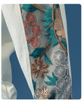 Close-up of the dense floral embroidery on the side panel