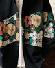 Close-up of the floral tapestry band on the black shirt jacket