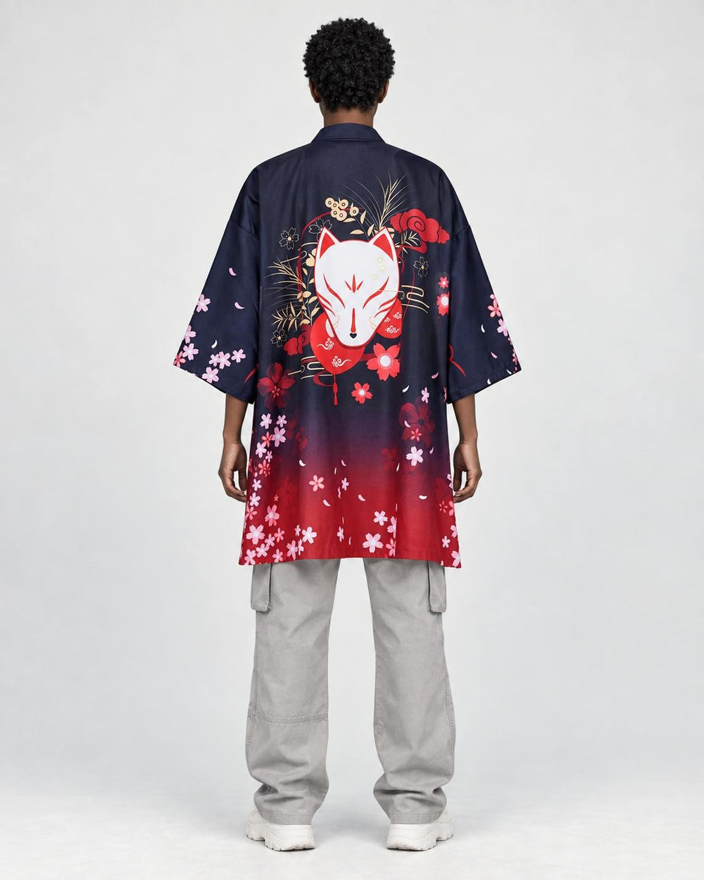 Model wearing the navy and red haori, back view with the white fox mask print