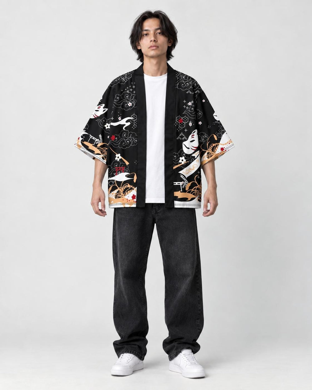Model wearing the black fox mask kimono open over a white tee, front view