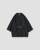 Black haori jacket with a knotted frog toggle, front view