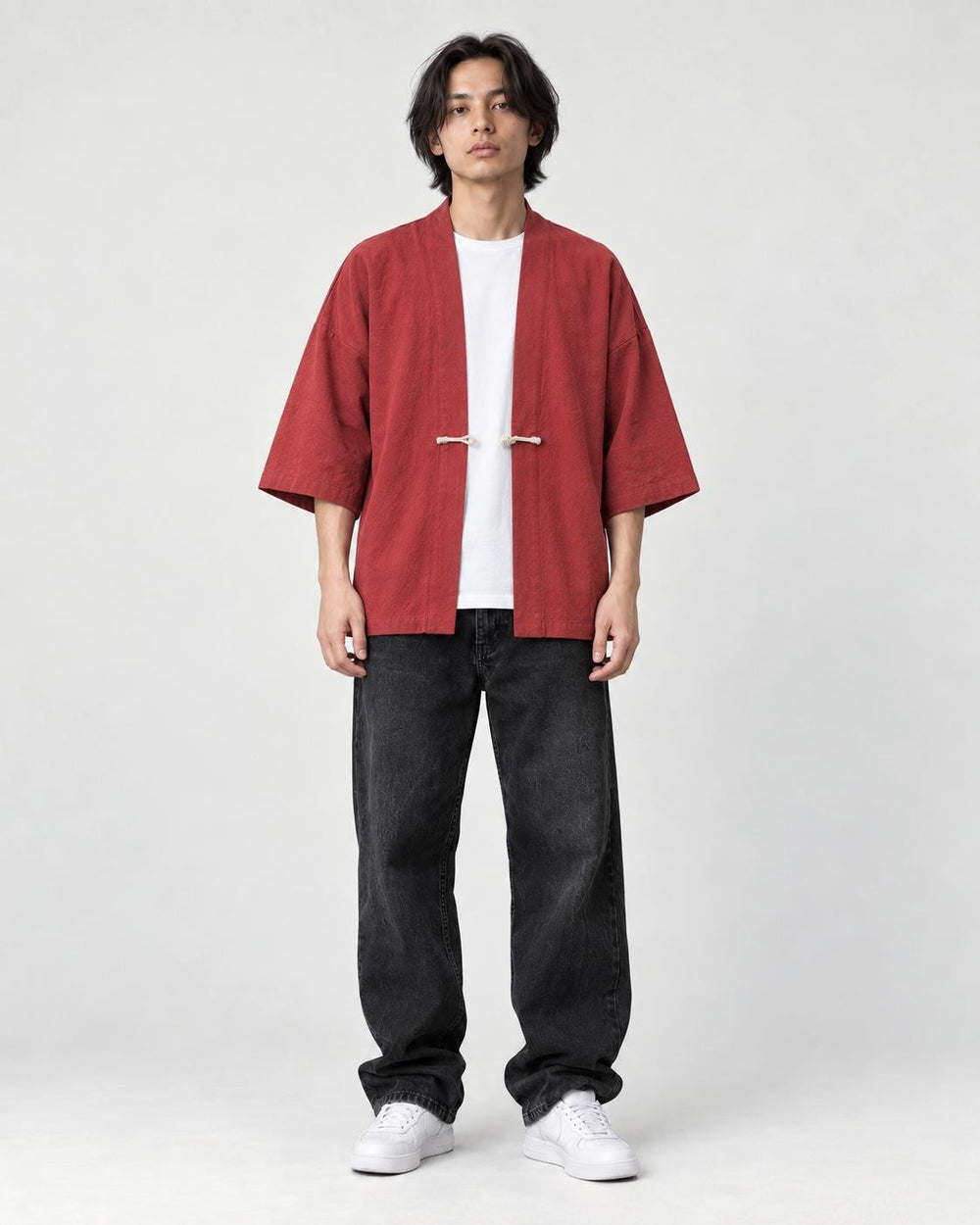 Model wearing the red haori jacket over a white tee, front view