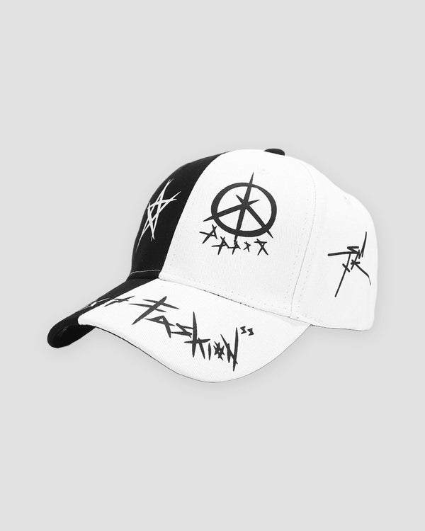 Black and white split graffiti cap, three-quarter view, embroidered peace sign