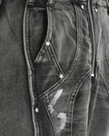 Close-up of the curved raised seams, rivets and white paint marks