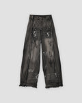 Washed black graffiti wide-leg jeans with raw hems, front view