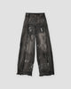 Washed black graffiti wide-leg jeans with raw hems, front view