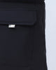 Close-up of the flap pocket on the black puffer jacket