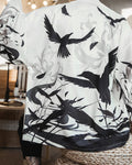Back of the white haori printed with black birds in flight over gray spider lilies