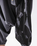 Close-up of the black ink splash print on the dark gray fabric