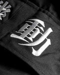 Close-up of the white 機動 kanji embroidered on the cargo pocket flap