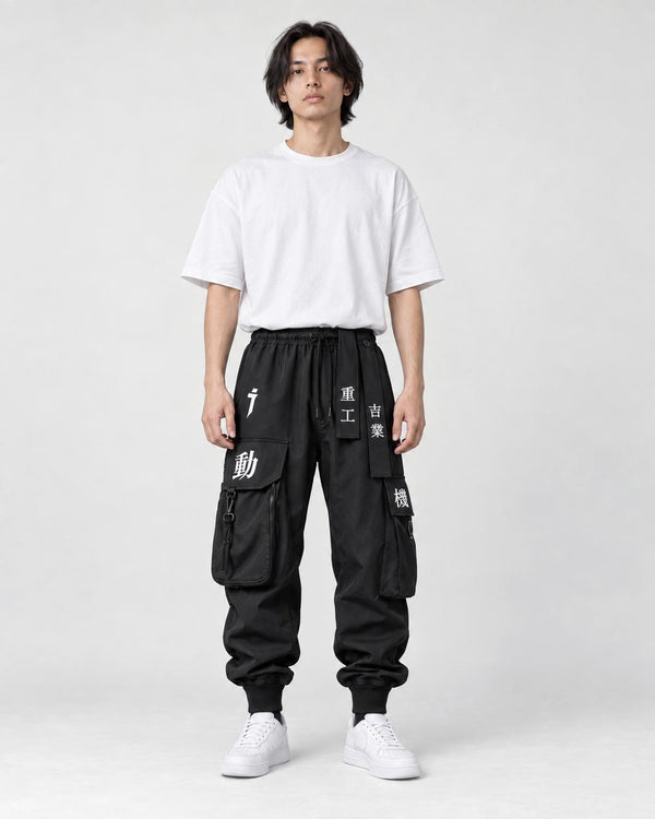 Model wearing the black kanji techwear cargo joggers with a white tee, front view