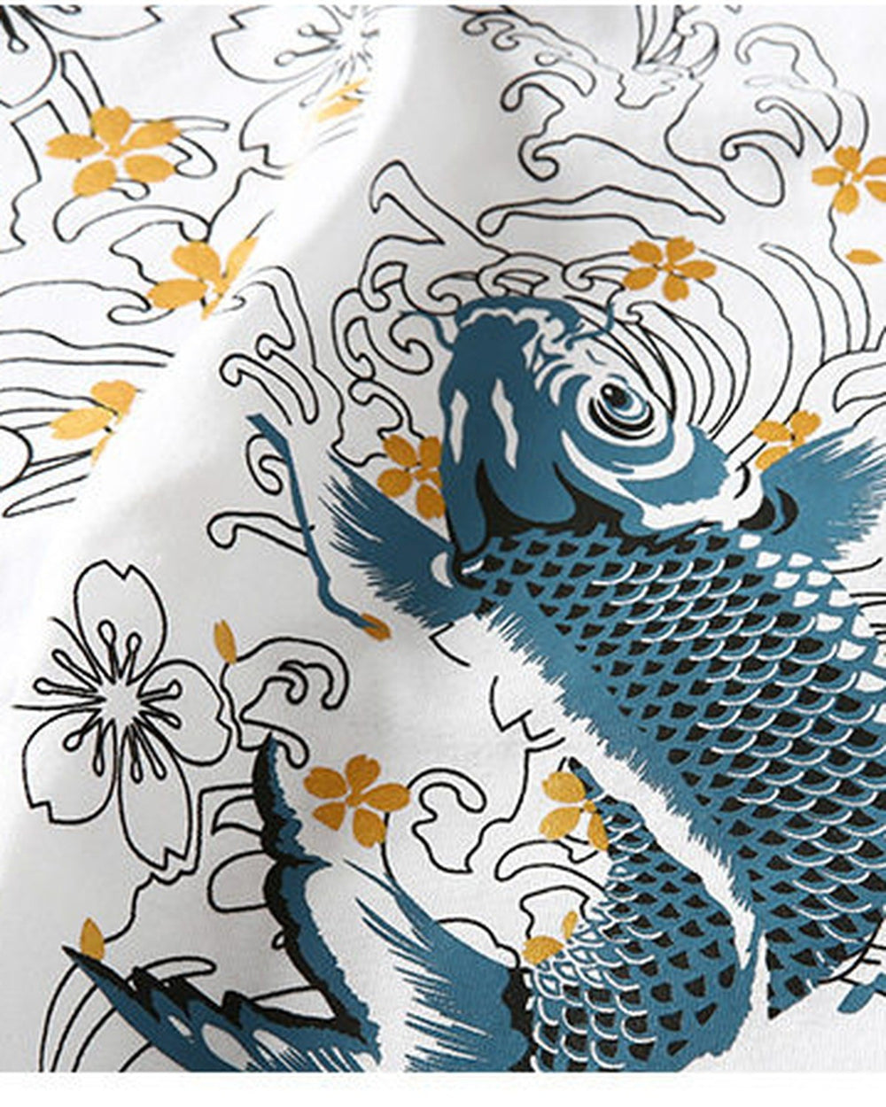 Close view of the blue-teal koi among white wave outlines and gold flowers on white cotton