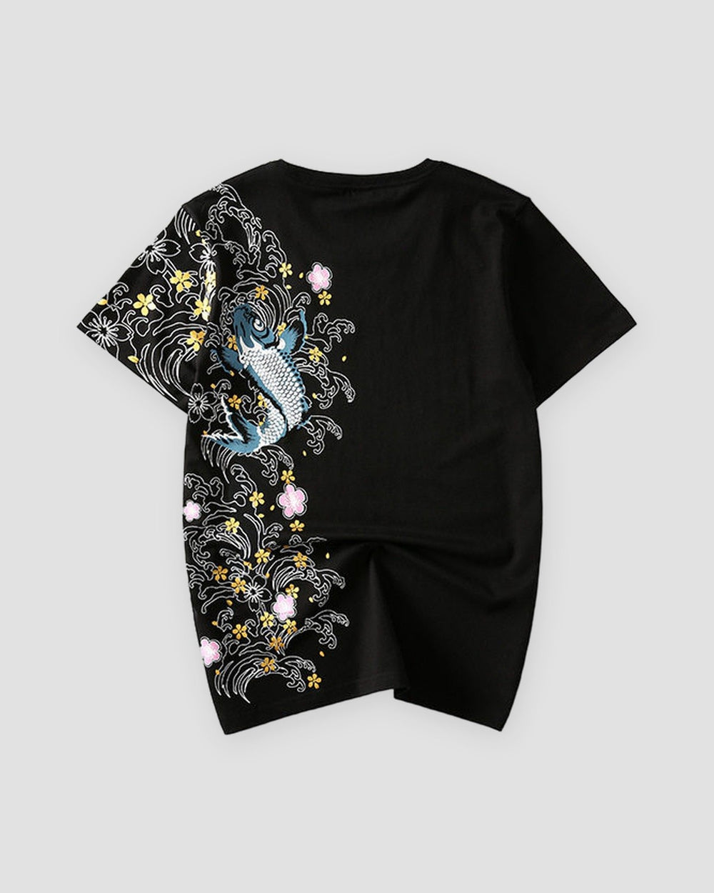 Back of the black T-shirt with a blue-teal koi leaping through white waves and gold and pink blossoms