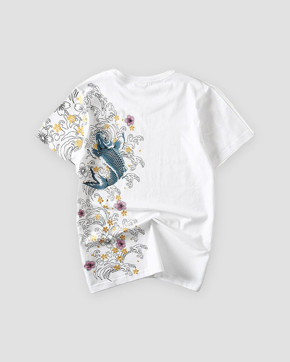 Back of the white T-shirt with a blue-teal koi leaping through white waves and gold and pink blossoms