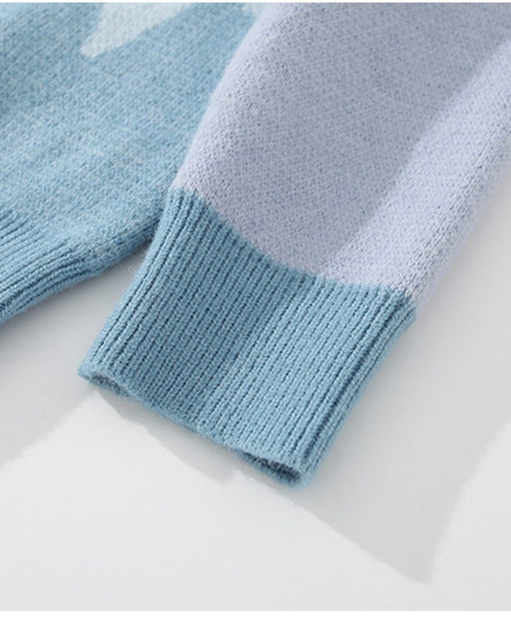 Close-up of the lavender sleeve and sky blue ribbed cuff