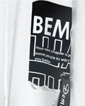 Close-up of the BEMC patch print and paint splatter on the white hoodie