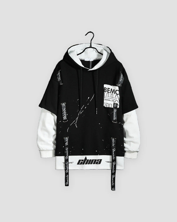 Black layered ribbon strap hoodie with white under-sleeves, front view