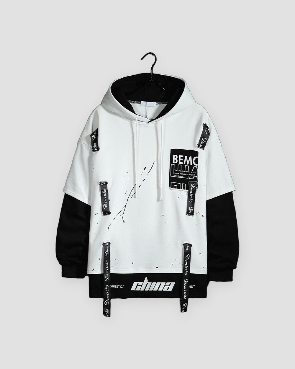 White layered ribbon strap hoodie with black under-sleeves, front view