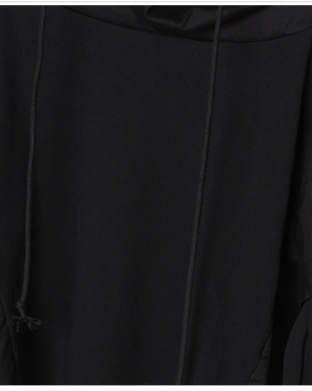 Close-up of the front of the black hoodie, with the drawcord, the layered sleeve panel and the angled seam