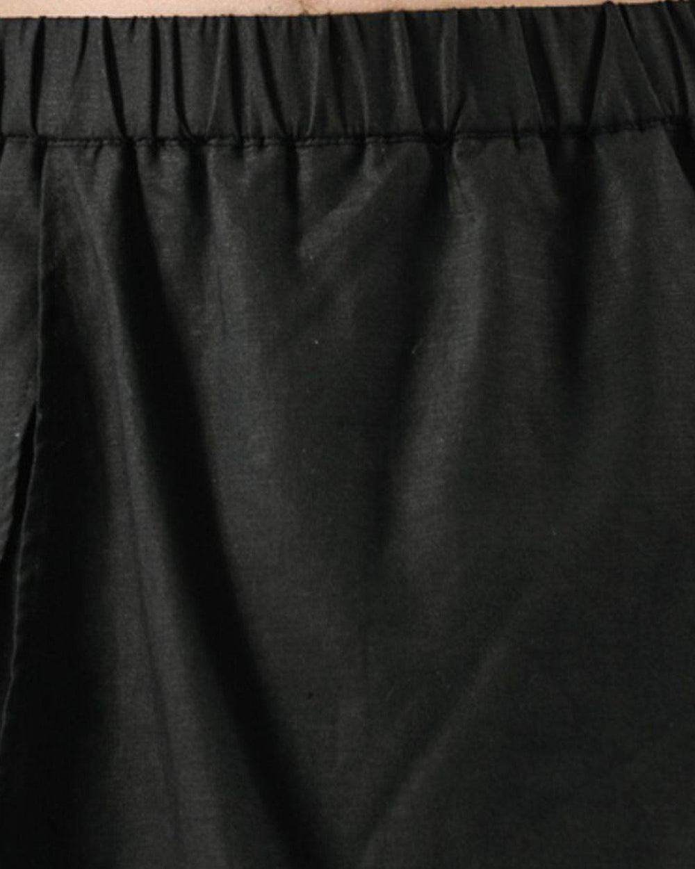 Close-up of the elastic waistband and the split wrap panel