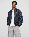 Model wearing the lion souvenir jacket open, three-quarter view