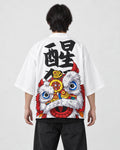 Model seen from behind in the white lion dance haori cardigan with a black calligraphy character and a lion head