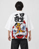 Model seen from behind in the white lion dance haori cardigan with a black calligraphy character and a lion head