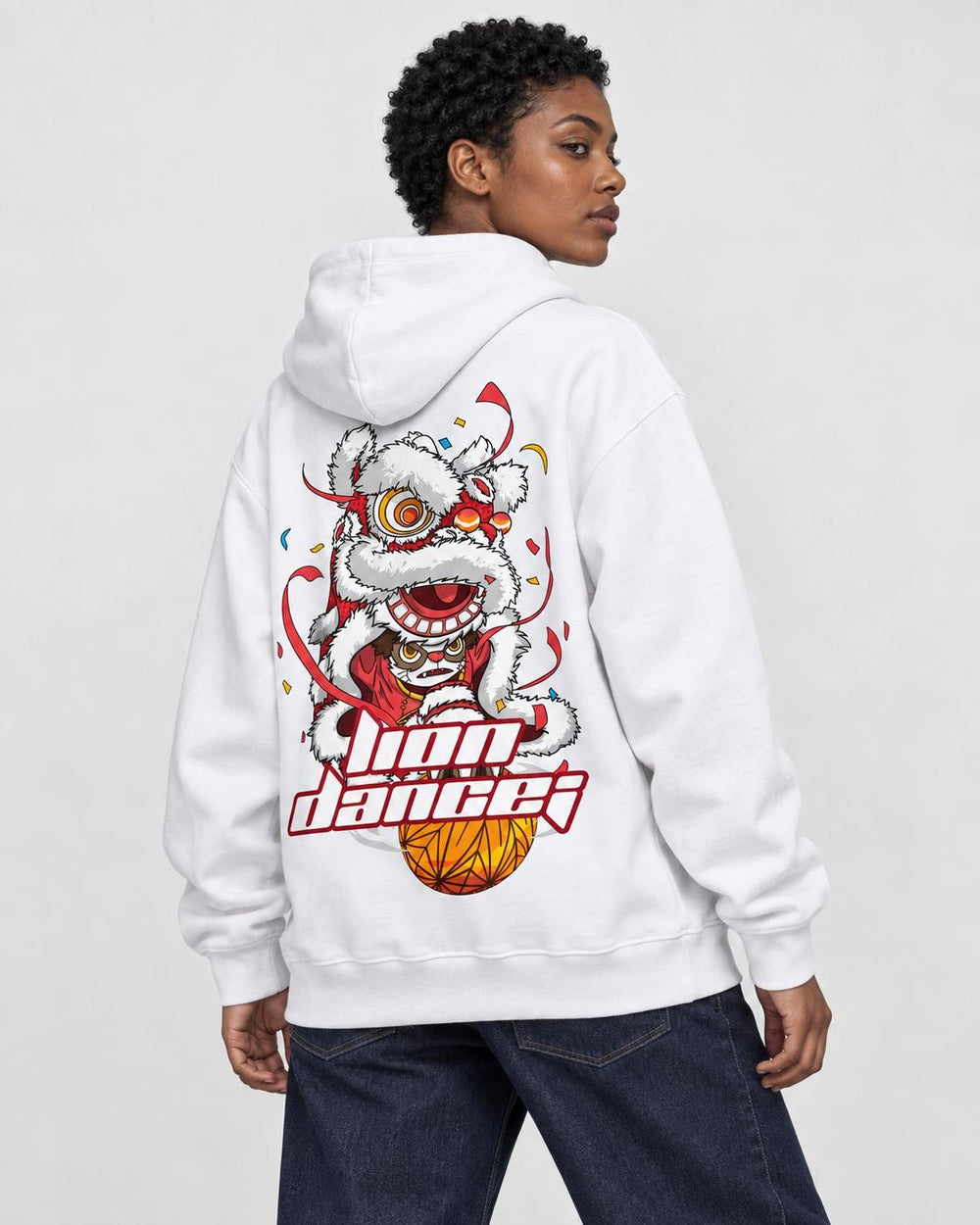 Model wearing the white lion dance hoodie, three-quarter back view