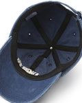 Inside of the cap, showing the taped seams and adjustable strap