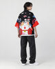 Model wearing the lucky cat haori, three-quarter back view