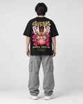 Model wearing the black daruma T-shirt, back view of the print