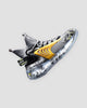 Gray high-top knit sneaker with yellow wing overlays and a marble print sole, side view