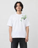 Model wearing the white bamboo and panda embroidered T-shirt with black jeans and white sneakers, front view