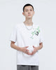 Man in the white embroidered T-shirt, showing the bamboo sprig and panda on the left chest