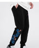 Side view of the black jogger pants showing the koi and wave embroidery down the leg