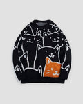 Black knit sweater covered in white line-drawn cat faces with one orange cat at the lower right, front view
