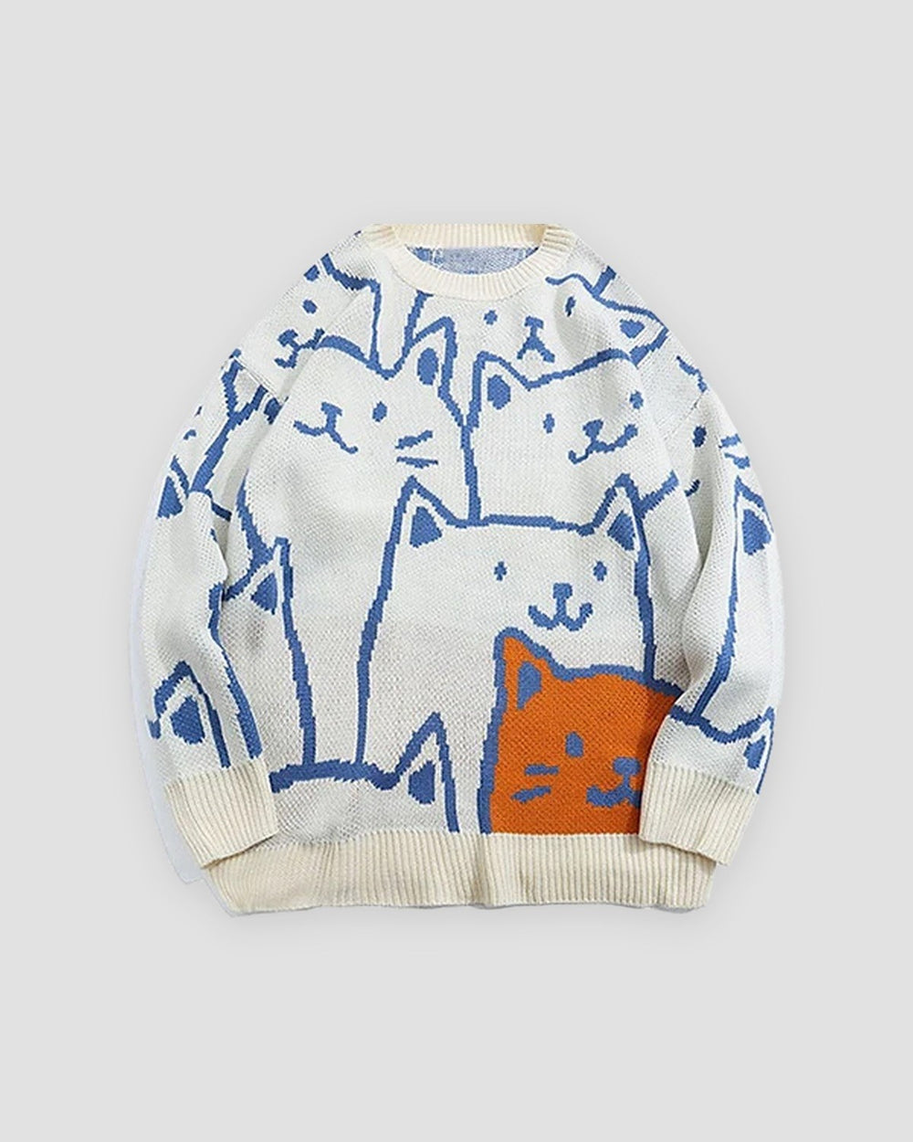 Cream knit sweater covered in blue line-drawn cat faces with one orange cat at the lower right, front view