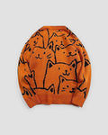 Back of the orange cat face knit sweater, with the crowd of black line-drawn cats