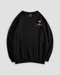 Black crew-neck sweatshirt with a small embroidered blossom sprig on the chest, front view