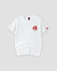 Front of the white T-shirt with a small red embroidered emblem on the left chest and a red tag on the sleeve