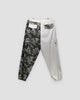 Back of the cream and wave-print jogger pants, with a flap pocket on each leg cut from the other leg's cloth