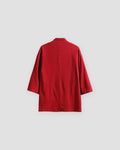 Back of the red linen haori cardigan with a small stand collar and a centre seam