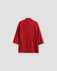 Back of the red linen haori cardigan with a small stand collar and a centre seam