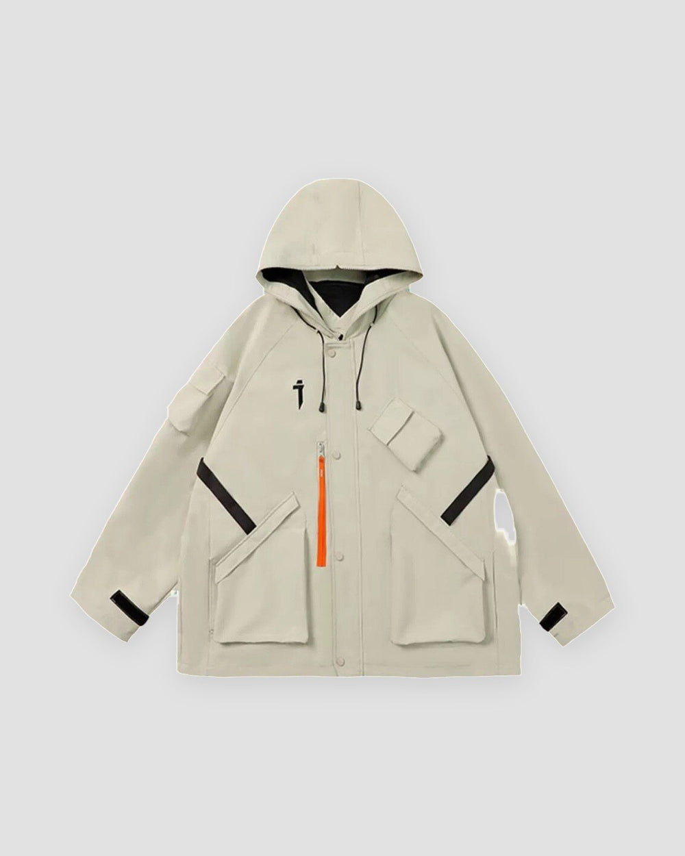 Beige hooded jacket with an orange zip pull, black chest straps, flap pockets and a small black logo, laid flat