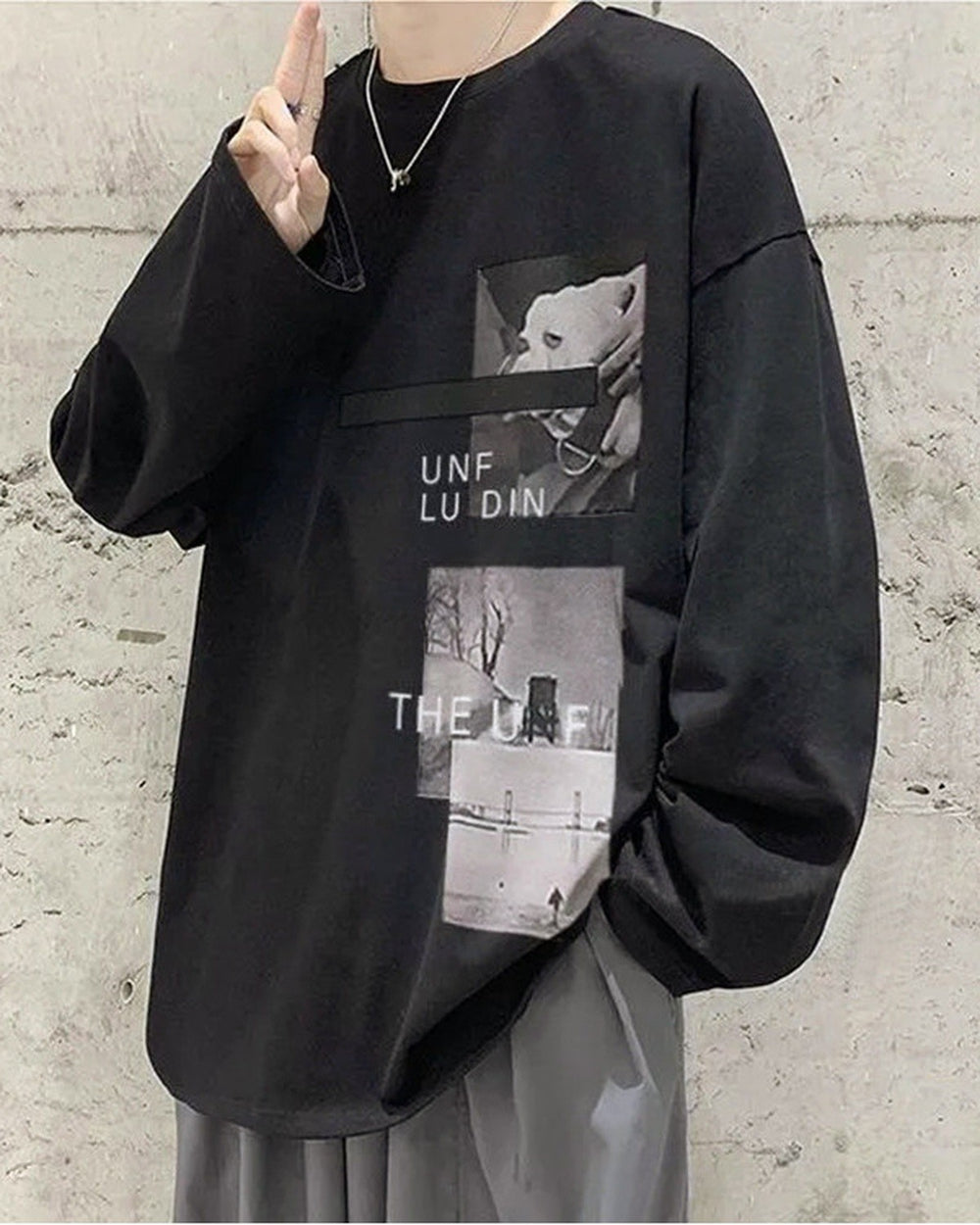 Black loose long sleeve tee with the white dog photo and the snowy figure photo printed on the chest