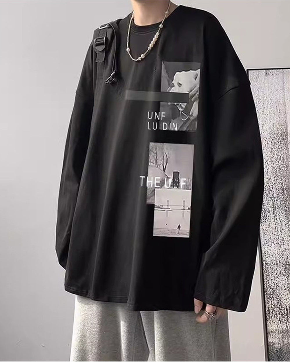 Black loose long sleeve tee with a black bar and two photo panels on the chest, worn with gray sweatpants
