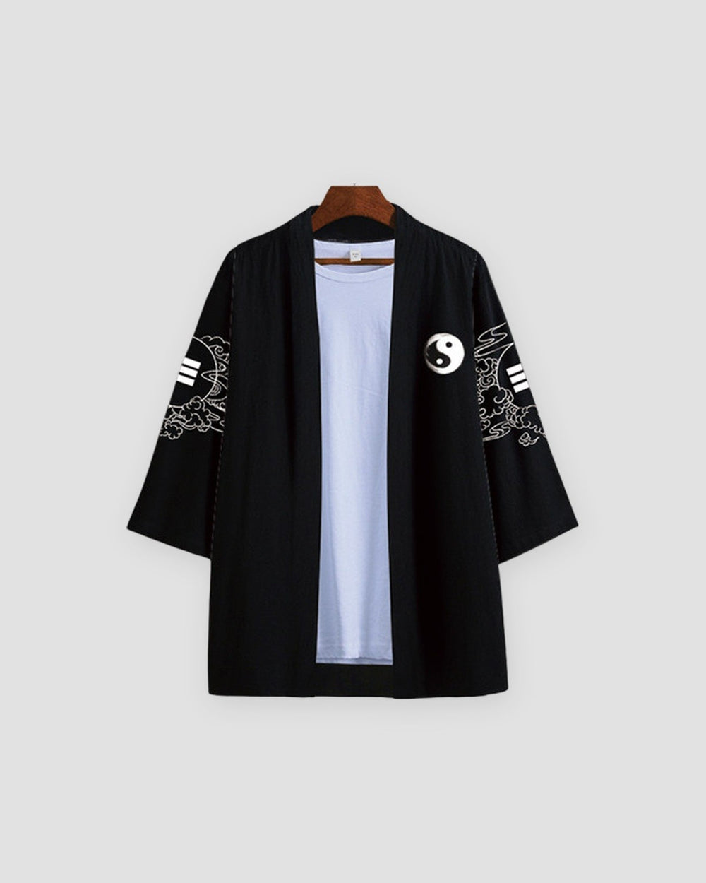Front of the open black haori with a small yin-yang on the left panel and cloud art on the sleeves